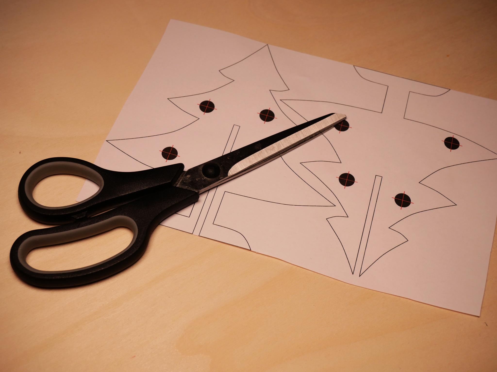 Cut away the large paper border around the templates